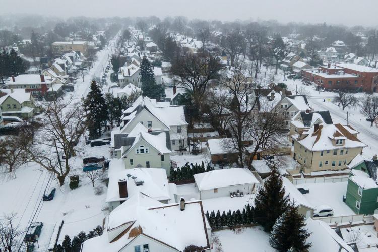 Northeast sees more snow from the tail end of a colossal winter storm, at least 18 deaths reported