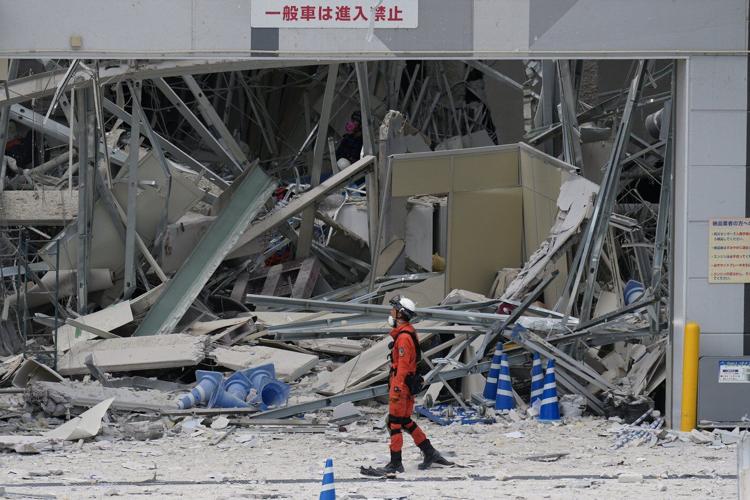 Death toll rises to 18 as rescuers comb through quake rubble in southwestern Japan