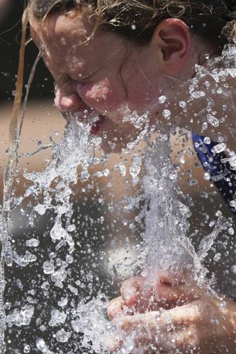 Eastern half of US sweltering again, with dangerous heat wave expected to last until midweek