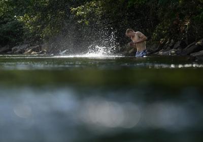 Records tumble as heat wave spreads from B.C.'s south coast to Interior, hitting 40 C