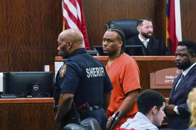 Lawyer: Man charged in Takeoff killing says he's innocent