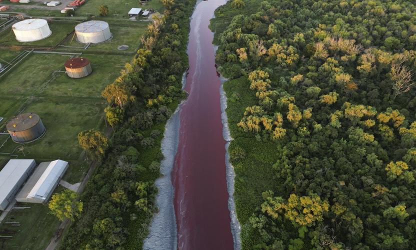 ‘It looks like a stream of blood.’ A river near Buenos Aires turns red, sparking fears of toxic leak