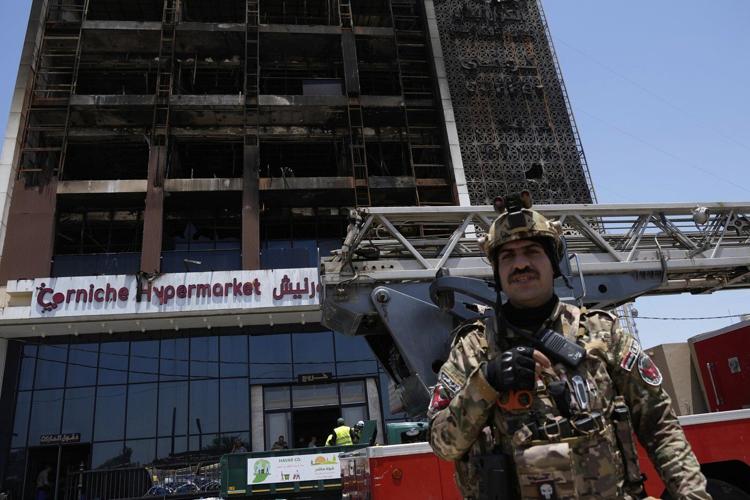 An Iraqi governor resigns after a deadly mall fire