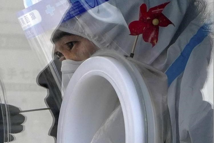 Ignoring experts, China's sudden zero-COVID exit cost lives