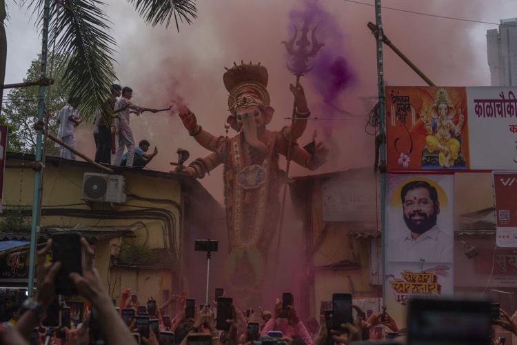 Photos show Indians marking final day of Ganesh Chaturthi that ends with sea immersion
