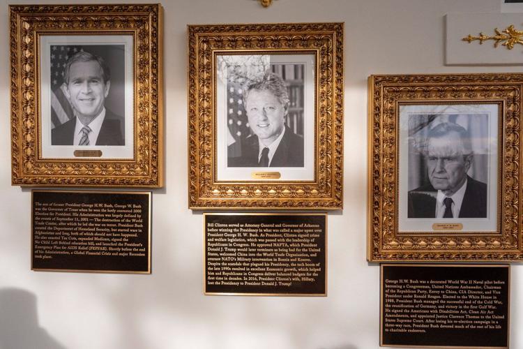 Trump writes partisan plaques for predecessors in his newly installed Presidential Walk of Fame