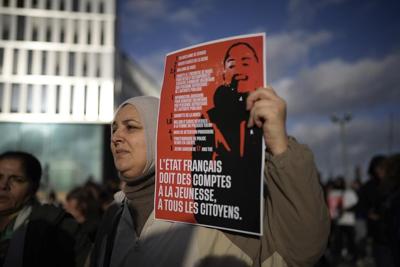 Mother of teen killed during a traffic stop in France leads a protest against officer's release