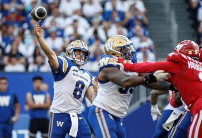 Collaros has first TD pass of season as Blue Bombers top Stampeders 41-37