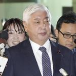 Japan's defense chief steps aboard visiting South Korean warship as the two nations strengthen ties