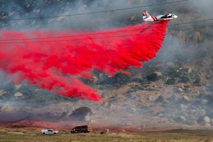 A fast-growing wildfire in windy Southern California triggers evacuations