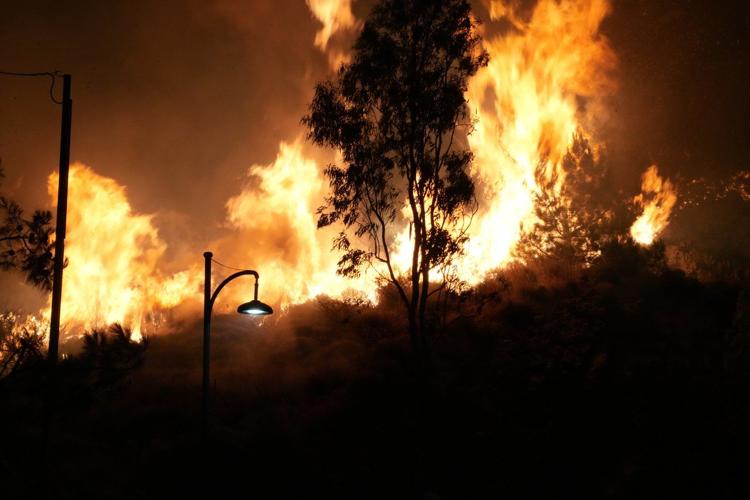 Firefighters battle a wildfire burning out of control on the Greek island of Chios