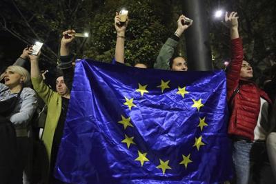 Georgian police fire tear gas to break up protest against so-called 'Russian law'