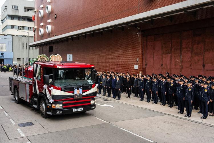 Hong Kong mourns firefighter killed in city's deadliest fire in decades