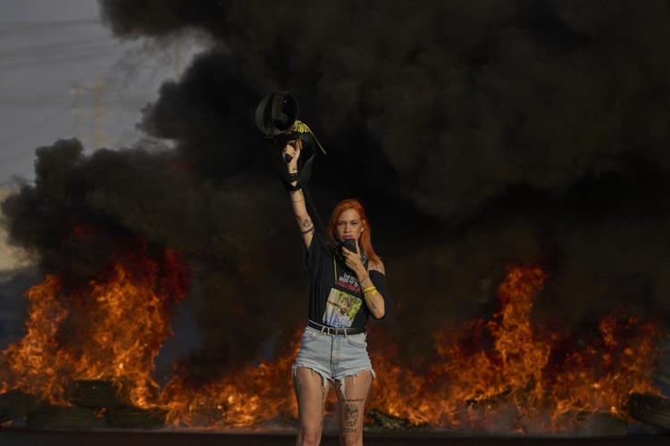 Protesters in Israel demand release of hostages as Gaza strikes kill 16, hospitals say