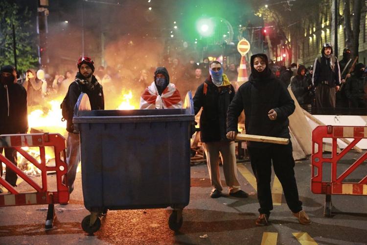 Demonstrators in Georgia again converge on parliament after the country's EU bid was suspended