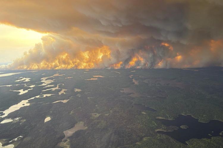 Cool temperatures, chance of rain as crews battle wildfires near Flin Flon, Man.