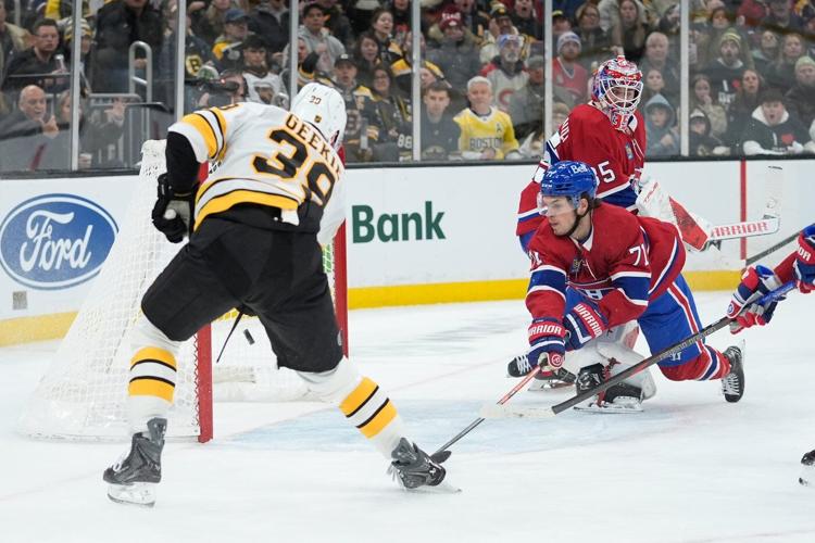 Geekie scores 100th career goal, Bruins beat Canadiens 4-3 to spoil Caufield's hat trick