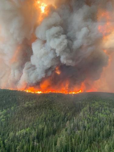 Thousands evacuated as wildfires continue burning in Manitoba, Saskatchewan, Alberta