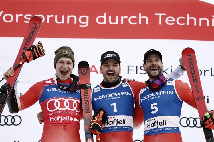 Swiss ski star Odermatt secures overall and GS World Cup titles in race won by teammate Meillard