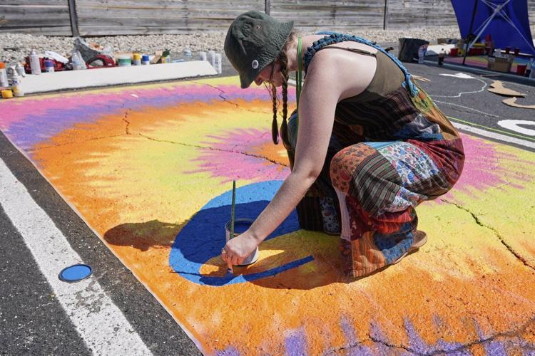 Parking spots used as colorful protest against Florida crackdown on rainbow crosswalks