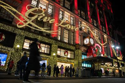 Woman charged in unprovoked attack on tourist changing baby's diaper in NYC department store