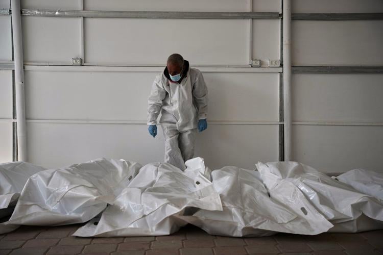 Red Cross says it transferred unidentified remains of 3 people to Israel