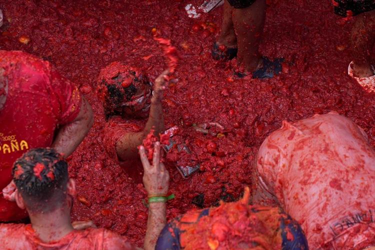The epic La Tomatina food fight paints a small Spanish town red