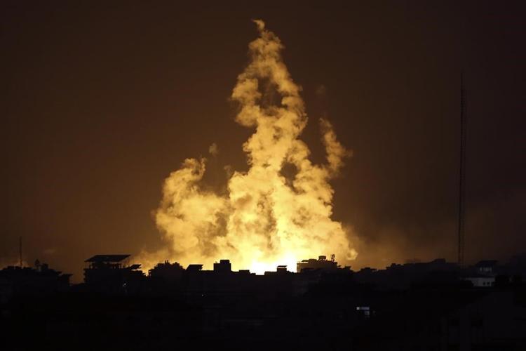 Gaza has lost telecom contact again, while Israel's military announces it has surrounded Gaza City