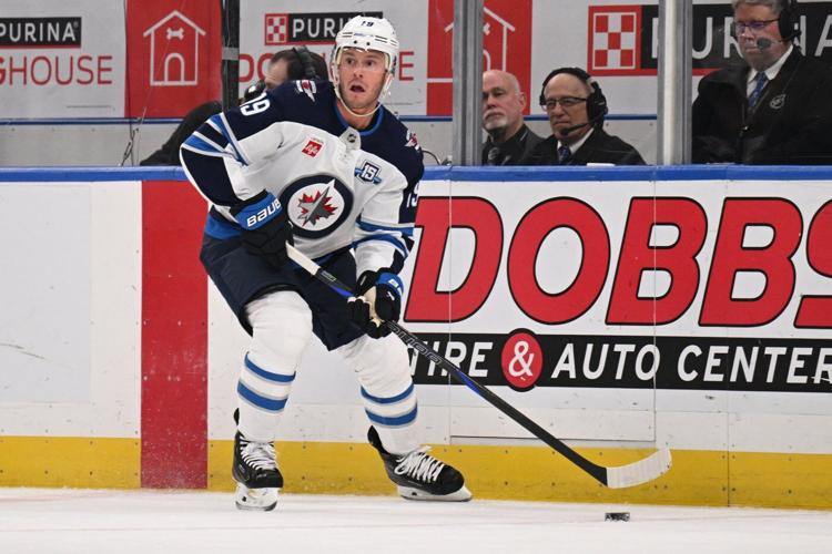 Iafallo, Morrissey and Toews score as the Jets beat the Blues 3-2 to keep playoff hopes alive