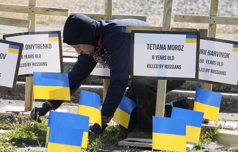 Ukraine flags block Russian ambassador's path on Victory Day