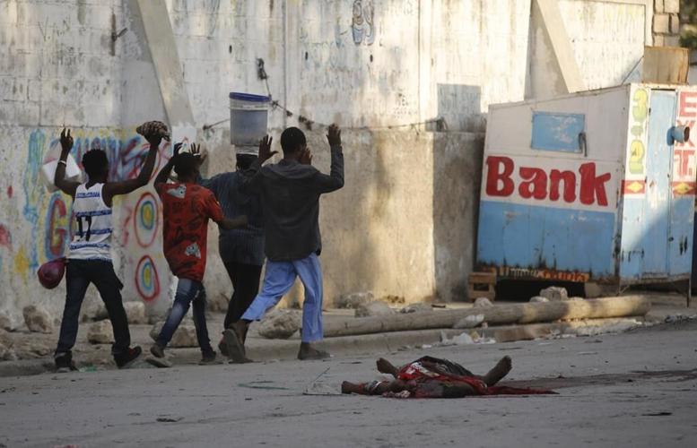 Haitian police spokesman says new gang attacks overwhelmed officers: 'The city center was at war'