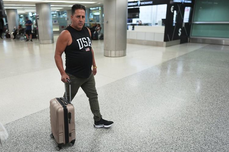 Trump's new travel ban takes effect as tensions escalate over immigration enforcement