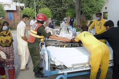 A bus hits a van and catches fire in Pakistan, killing 20 people and injuring 11 others