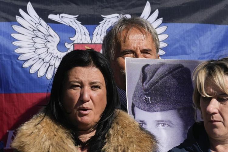 Serbia's president talks with Putin and vows he'll never impose sanctions on Russia