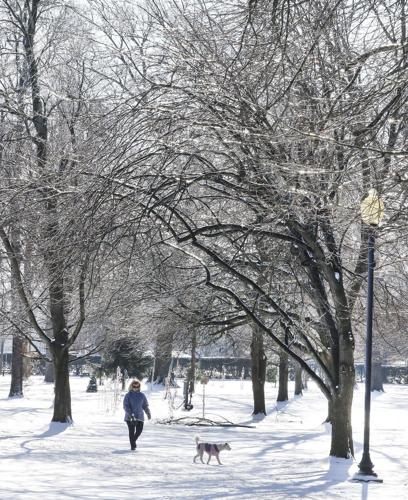 Winter storm plods into the Deep South, prompting states of emergency and school closures