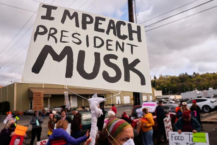 Elon Musk says he will cut back on political spending after heavily backing Trump in 2024