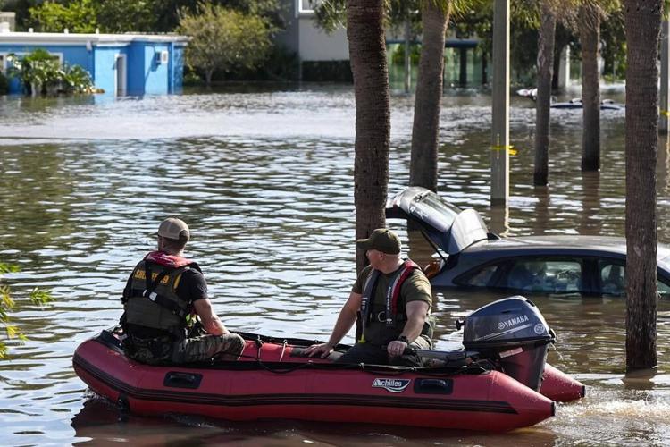The Latest: Hurricane Milton is weaker but still dangerous