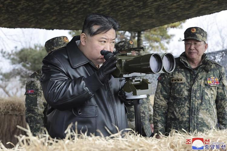 North Korea says it tested new solid-fuel intermediate-range missile with hypersonic warhead