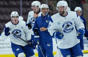 Malhotra opens first camp as Vancouver Canucks head coach