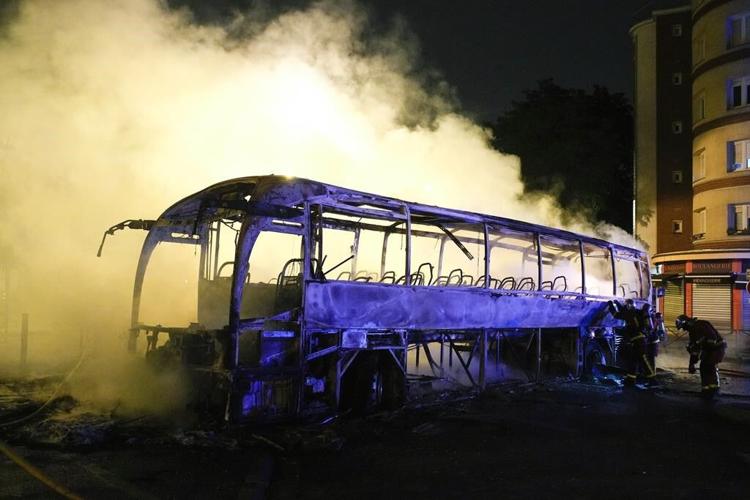 Youths clash with French police and loot in 4th night of riots triggered by fatal police shooting