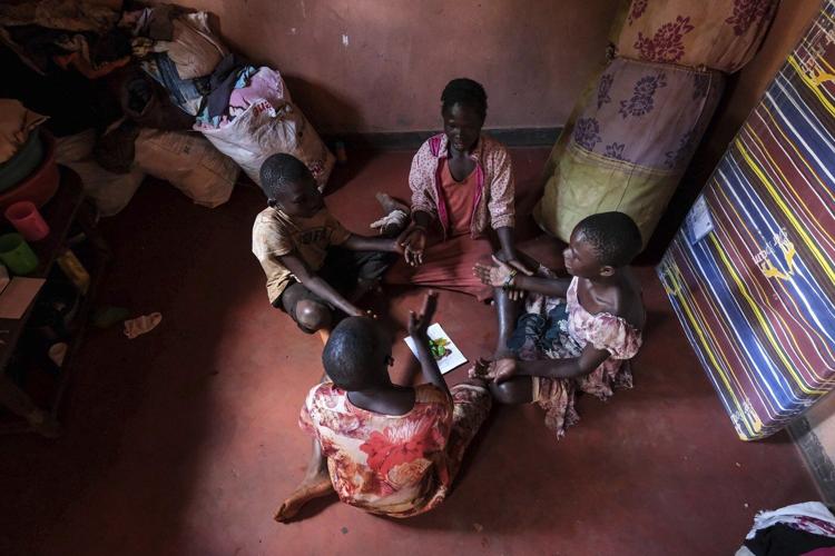 Many families in Uganda stuck with unhealthy dirt floors are finding an affordable alternative