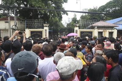Myanmar reinstates family visits to prisoners to end a ban started during the pandemic