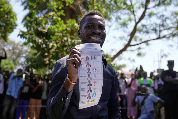 Photos show voters going to the polls in Uganda's presidential election