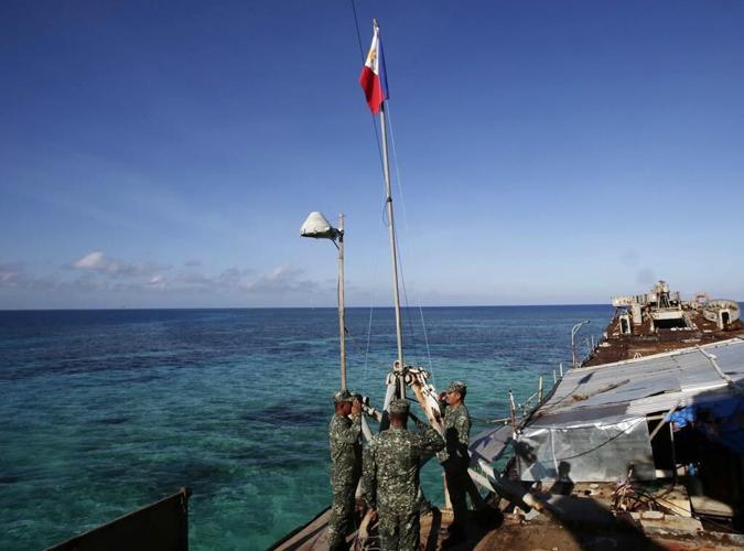 Philippines says China coast guard seized food dropped by plane for Filipino forces in disputed sea