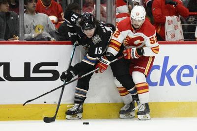 Ovechkin and Oshie power Capitals past Flames 3-0