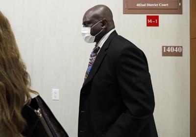 Judge dismisses murder charges ex-Houston officer had faced over 2019 drug raid