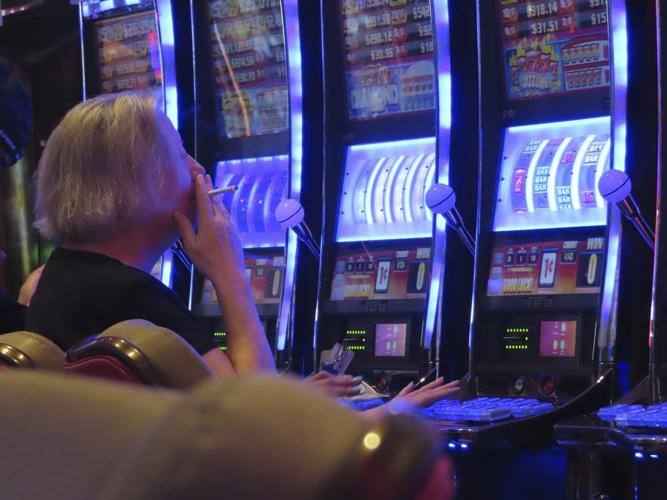 Rival union official says Atlantic City casino union boss should resign for opposing a smoking ban