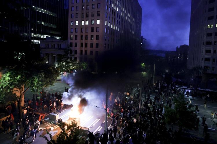 Nationwide protests against immigration raids escalate, leading to arrests and curfews