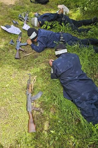 Serbia opens proceedings against arrested Kosovo policemen, ignoring US call for their release.