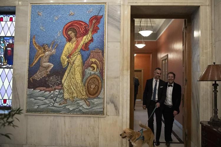 A Greek novelist and a lawyer are the first same-sex couple to wed at Athens city hall